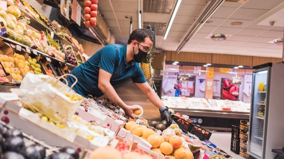 grocerystoreworkercreditpedroarqueromomentgettyimages (1)