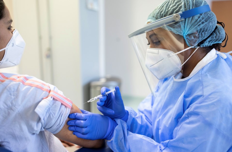 COVID vaccine shot - getty