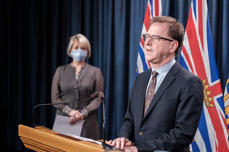 Adrian Dix with Bonnie in a mask
