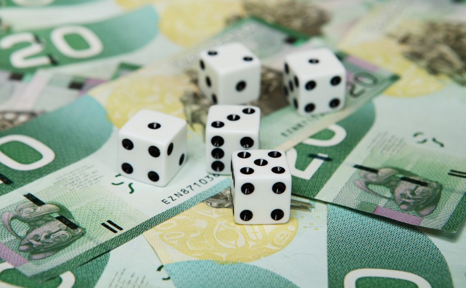 Cash-dice-creditCostinT-iStock-GettyImagesPlus