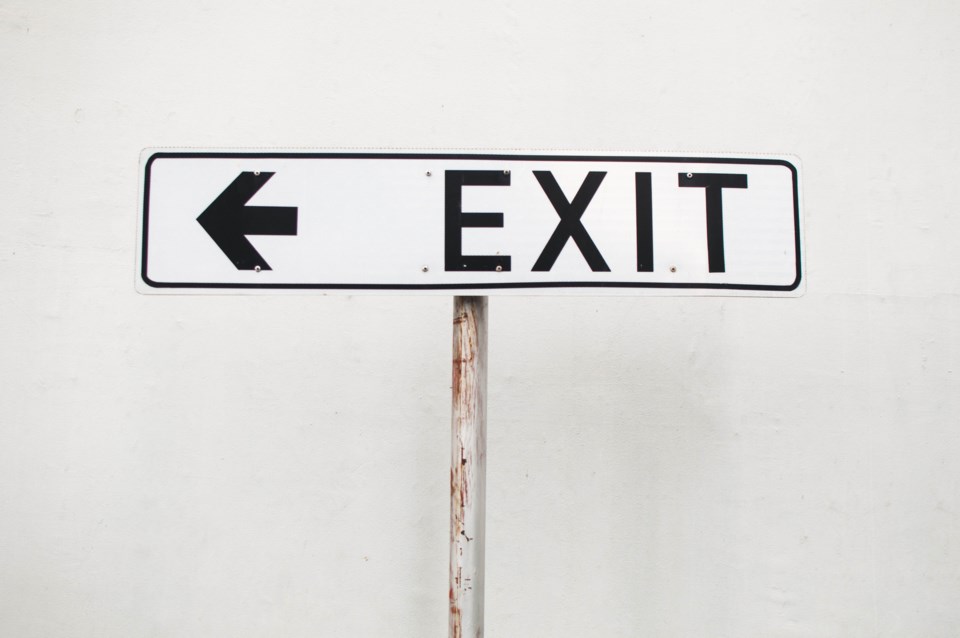 Exit-sign-credit-KarlTapalesMomentGettyImages