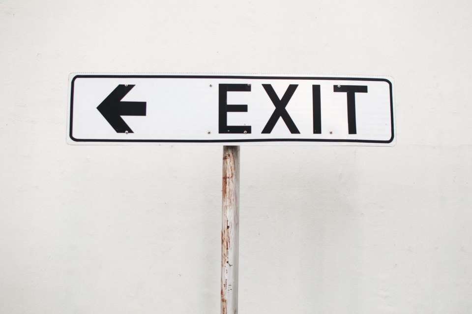 Exit-sign-credit-KarlTapalesMomentGettyImages