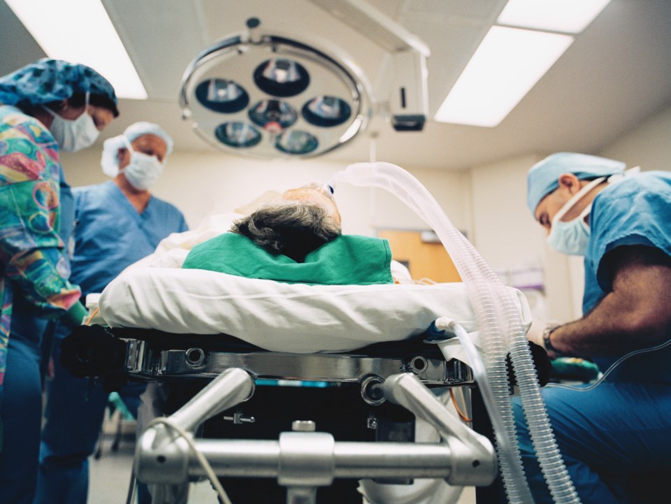 hospital operating room - with masks- getty - Reza Estakhrian