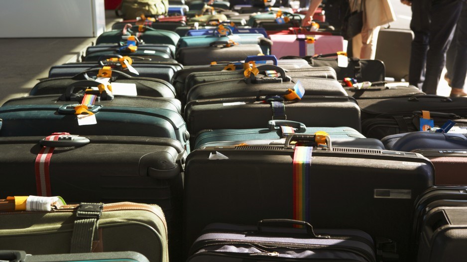 luggage-suitcase-immigration-alanpowdrillstonegettyimages