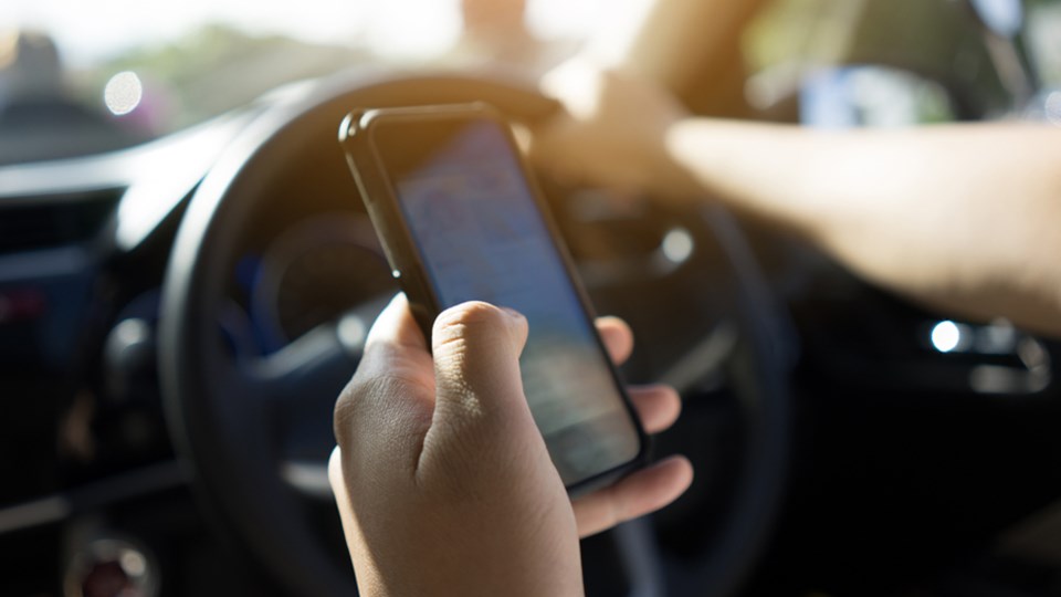 Texting-while-driving-web-skaman306-Moment-Getty Images