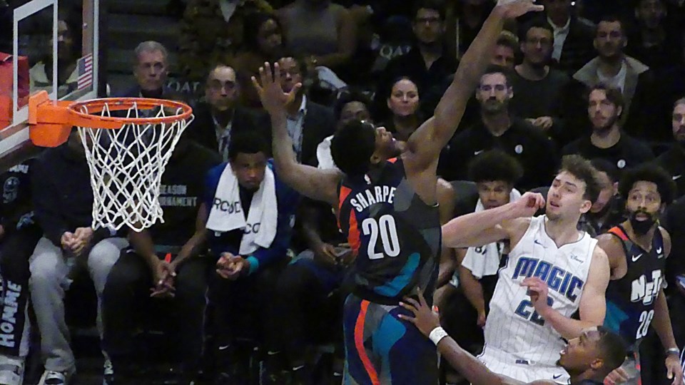 sharpe-defending-shot