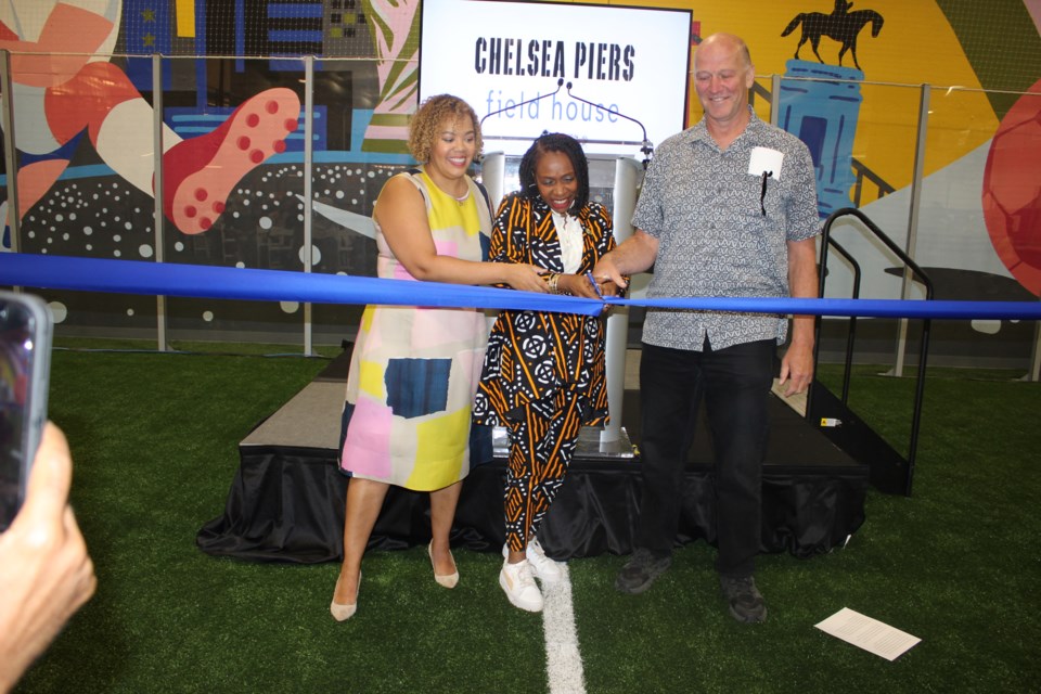 (L-R) Chief Operating Officer Jessie Betts Dreyfuss, Rep. Yvette D. Clarke and Chelsea Piers Principal David Tewksbury cut the ribbon. 