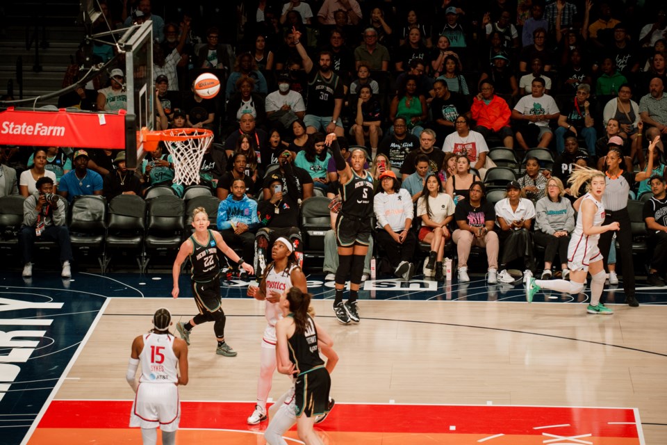 Kayla Thornton of the New York Liberty attempts a 3-point shot in a game against the Washington Mystics.