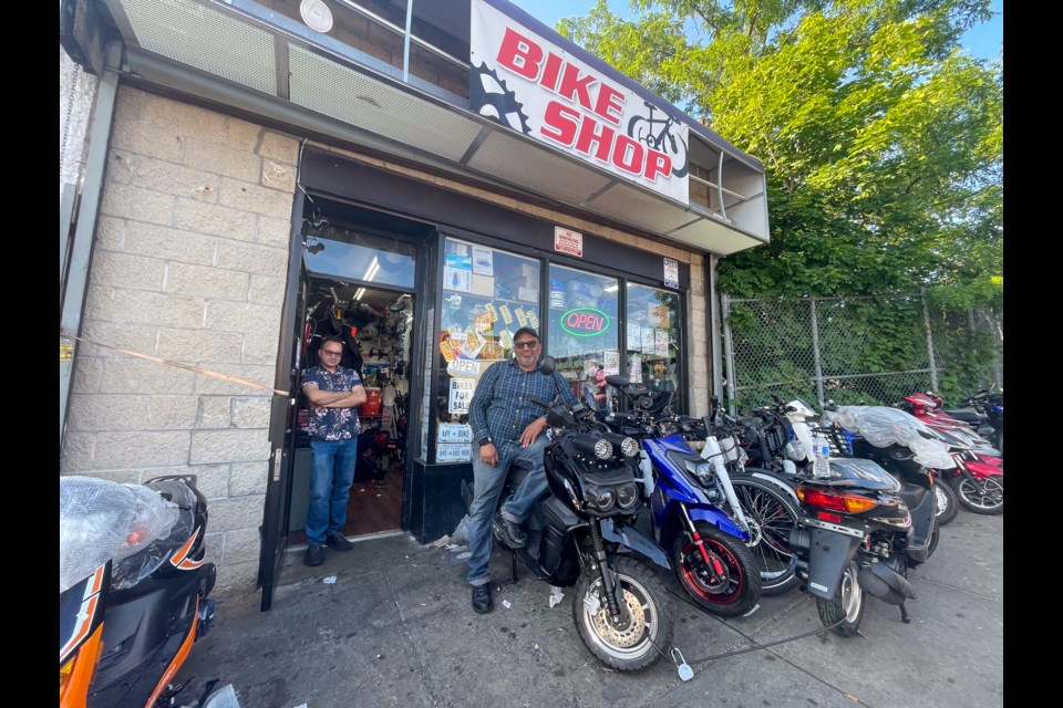 Gurmukh and Darvinder Singh at the Bike Shop neat the Sutter Ave. station.