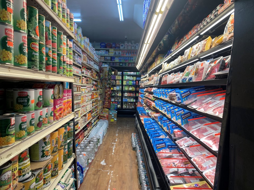 narrow-interior-of-chuckys-supermarket-photo-credit-thao-nguyen-for-bk-reader