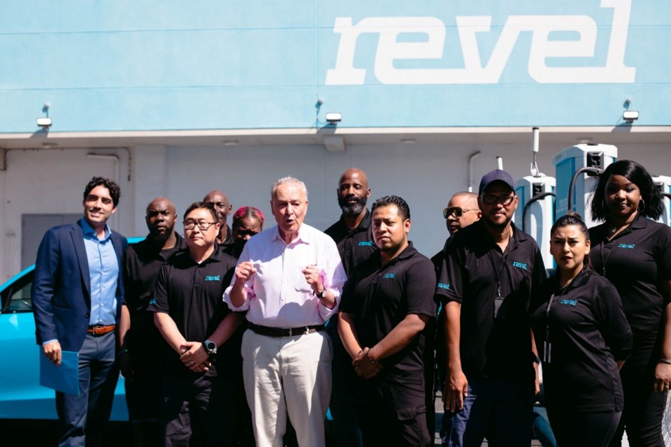 Senator Schumer delivering remarks at Revel’s flagship Superhub alongside a group of Revel employee drivers and CEO Frank Reig. 