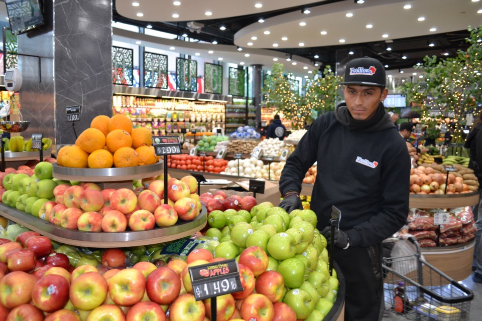 A worker at the new Foodtown on 54 Noll Street in Bushwick.