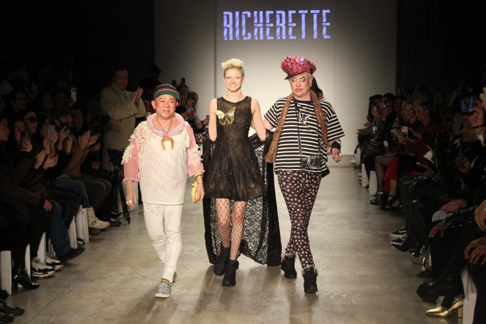 Richie Rich (right) walks with models for a final bow after the show. Photo: Miranda Levingston for BK Reader.
