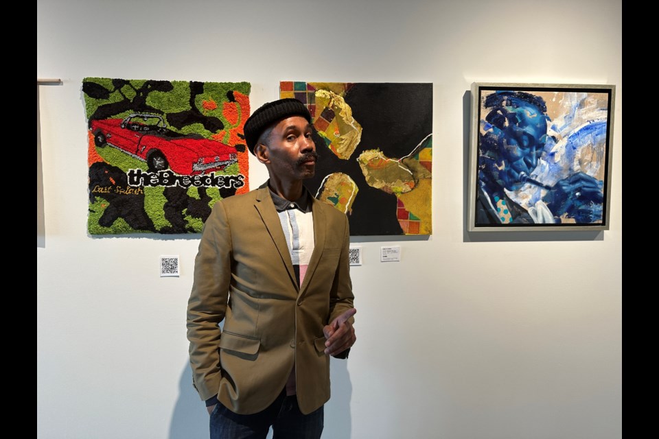 Richard Burroughs, curator for the art exhibit, "Cover Lover Remix-- The 90s Edition," showing now through April 29, at Brooklyn Navy Yard's DSGN Gallery