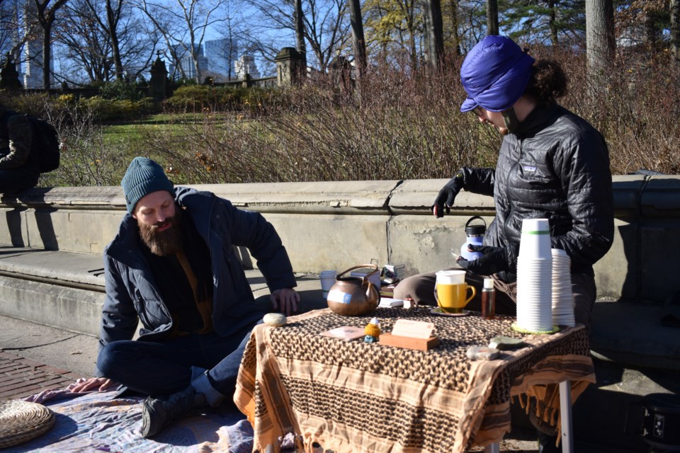 Miles with his friend he made through the Tea Stand