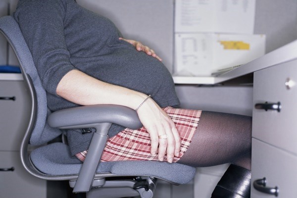 Pregnant women handling the conflict of Discrimination and prejudice in the workplace.