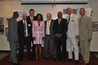 From left to right: Woody Pascal, Deputy Commissioner Office of Rent Administration; Manny Burgos, Special Assistant to the Commissioner; Bruce Falbo, Bureau Chief of the Rent Information Bureau; Deneane Brown, Director, Upper Manhattan Borough Rent Office; Greg Fewer, Director of Policy Unit, ORA; Commissioner/CEO Darryl C. Towns; Assemblyman Herman "Denny" Farrell; Richard White, Deputy Commissioner Tenant Protection Unit.