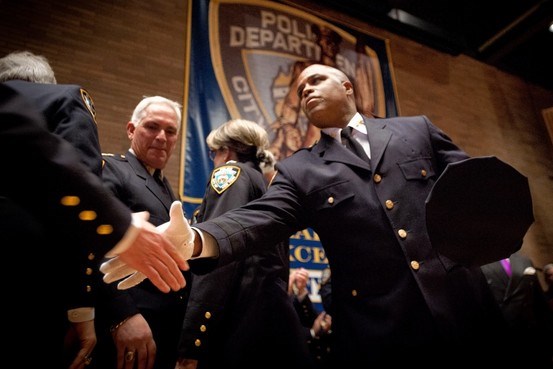 Newly appointed Chief of Department Philip Banks III shakes hands at an NYPD promotion ceremony  Photo: https://blogs.wsj.com