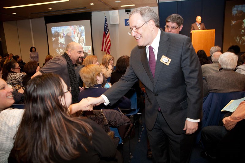 Manhattan Borough President Scott Stringer greets delegates after they approved a resolution to endorse him in his run for city comptroller