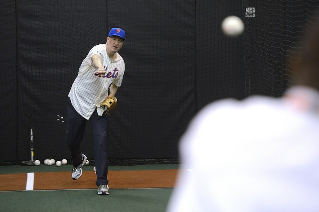 Mayor Bill de Blasio warms up in preparation for throwing out the first pitch for the Mets on opening day at CitiField in Queens  Mayor Bill de Blasio warms up in preparation for throwing out the first pitch for the Mets on opening day at CitiField in Queens on Monday, March 31, 2014. Credit: Rob Bennett for the Office of Mayor Bill de Blasio