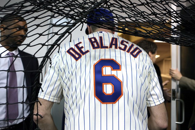 Mayor Bill de Blasio throws out the first pitch for the Mets on opening day at CitiField in Queens  Mayor Bill de Blasio throws out the first pitch for the Mets on opening day at CitiField in Queens on Monday, March 31, 2014. Credit: Rob Bennett for the Office of Mayor Bill de Blasio