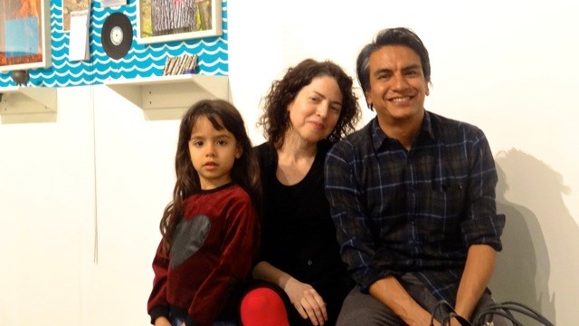 Valerie Tevere (center) and Angel Nevarez (right) with their daughter at BRIC Media Art House where they hosted "Another Protest Song Karaoke"