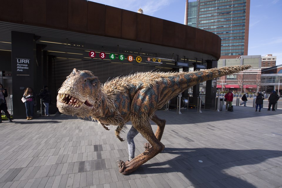A dinosaur from Walking With Dinosaurs visits Barclays Center to promote their upcoming Summer 2014 show. Photo: Angela Cranford/Barclays Center