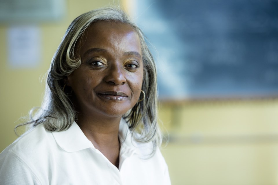 Belinda White, a START patient, in her uniform as a home health aid.