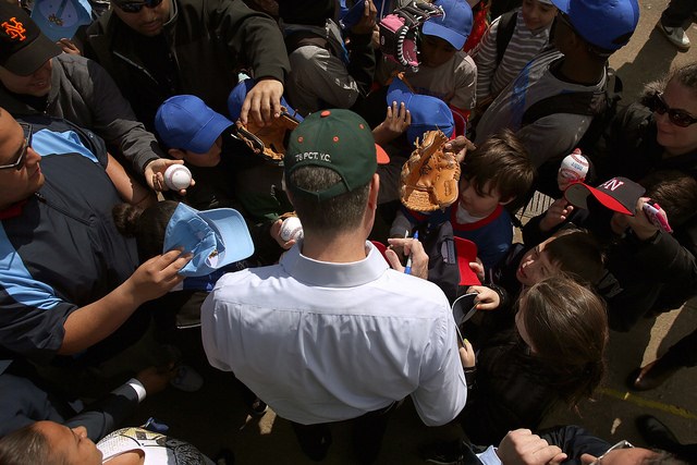 Mayor Bill de Blasio signs baseballs at Prospect Park Little League Opening Ceremony in Brooklyn on Saturday, April 5, 2014. Photot: Rob Bennett for the Office of Mayor Bill de Blasio
