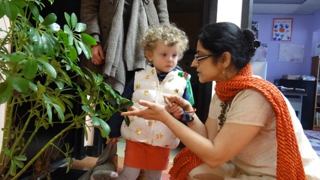 Sudha Seetharam, co-founder of Trilok School, with a young student