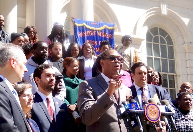 City Councilmember Robert Cornegy with school advocates on the steps of City Hall in support of Cornegy's Audible Alarms Bill