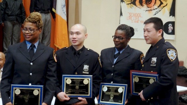 (l to r): Shaun Alexander, Officer James Li , Khadijah Hall and Officer Randy Chow receive a citation for their act of courage