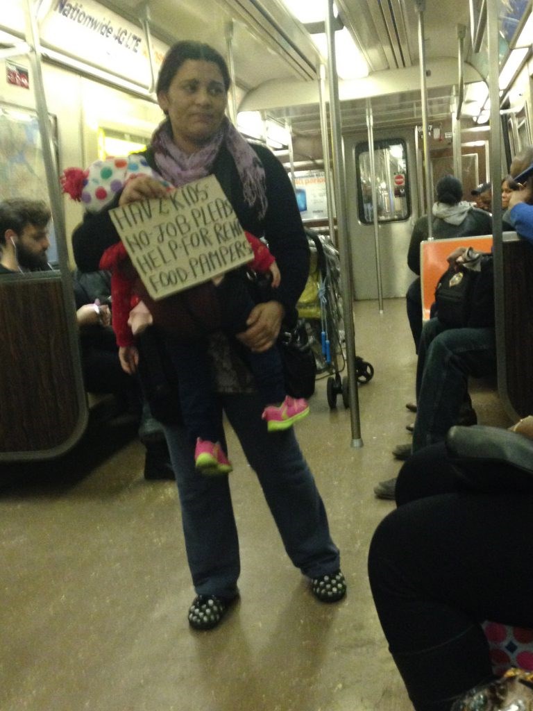 Panhandling Mother on the train