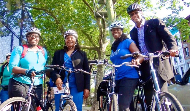 City Councilmember Robert E. Cornegy (far right), his wife and his staff gear up for a "Bike to Work" trip across the Williamsburg Bridge (l to r) Dynishal Gross, Legislative Director; Steffani Zimmerman, Communications Director; and Michelle Cornegy, wife of Robert E. Cornegy, Jr.