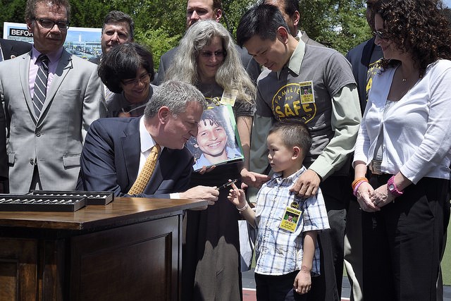 Mayor Bill de Blasio signs package of traffic safety bills in Queens  Photo: Diana Robinson for the mayor's offiice