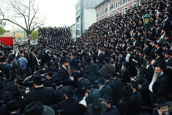 Chabad Sluchim in front of 770 Eastern Parkway who gather from around the globe annually in honor of Rabbi Menachem Shcneerson Photo: Baruch Ezagui