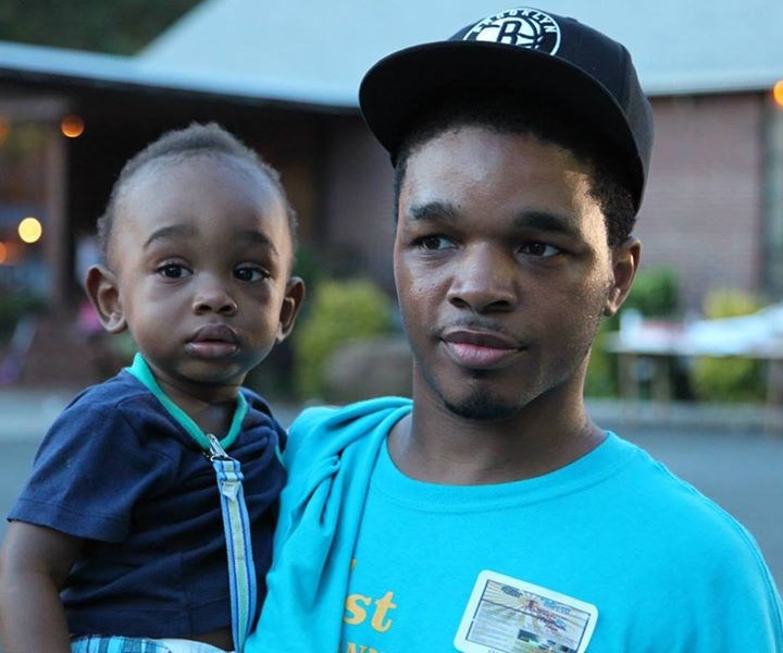 Ephraim Benton, founder of Daddy Children's Day, and his son Photo: madamnoire.com