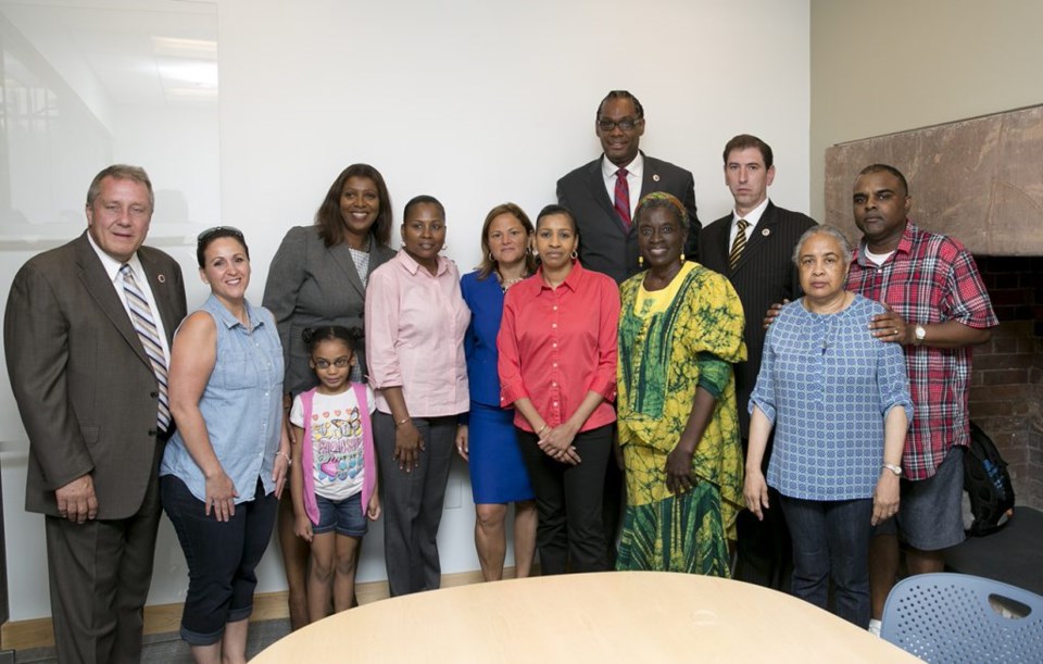 Councilmember Robert Cornegy with Avonte Oquendo's family shortly after "Avonte's Law" passed in the City Council