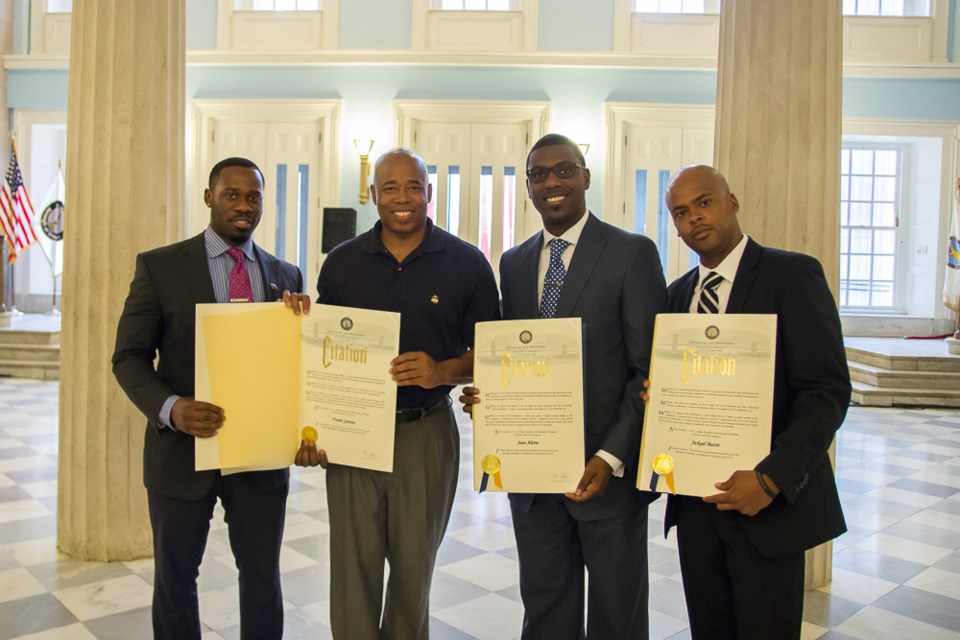 Receiving Citations from Brooklyn Borough President Eric Adams for our commitment to our youth & the work we do within The Do Right, Do Good Scholarship Award. (L to R) VP Media Director, Frank Gateau, Borough President Eric Adams, Entrepreneur Jean Alerte & Business Consultant Jickael Bazin Photo: Emmanuel Afolabi