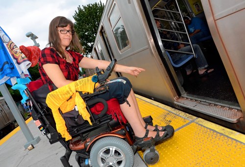 Michele Kaplan is frustrated and often struggles in her wheelchair to get over the large gap between the train car and the platform. Photo: Elizabeth Graham