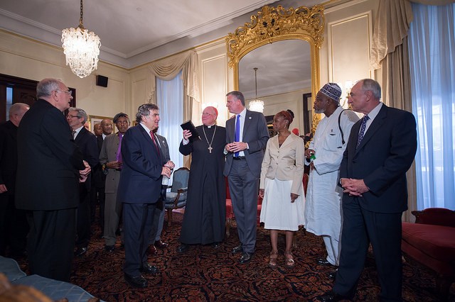 Mayor Bill de Blasio attends an interfaith roundtable meeting on strengthening police-community relations with members of New York City's clergy, hosted by Timothy Cardinal Dolan. Credit: Rob Bennett/Mayoral Photography Office