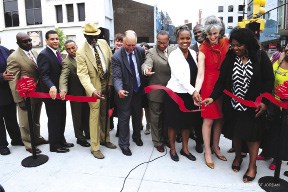 At the ribbon-cutting for the  new Marcy Plaza Shown (l to r): Colvin Grannum, Kyle Kimball, Al Vann, David Jones, Wayne Winborne, Tremaine Wright, Kate Levin and Joyce Turner