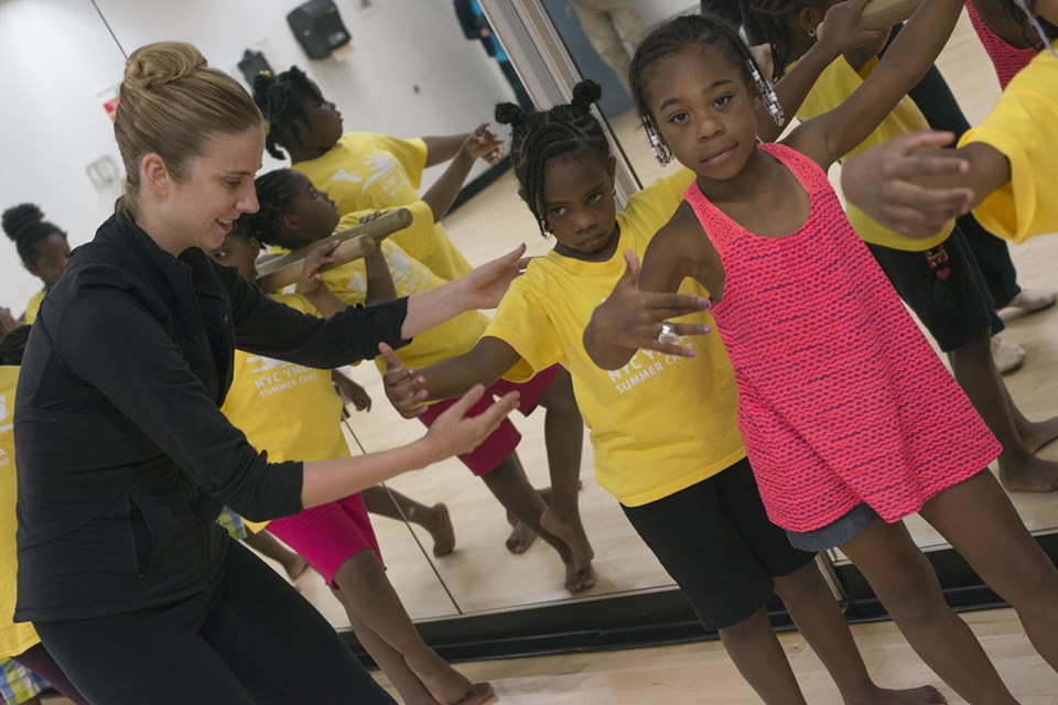 Michele Wiles instructing the summer camp students.