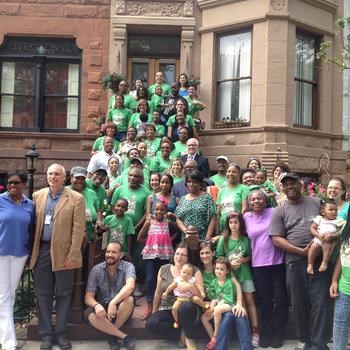 Macon Street residents celebrate their block winning the 2014 Greenest Block in the Borough contest.  (Photo Courtesy Gothamist)