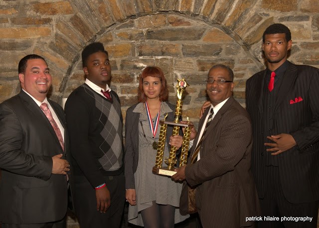 Gold medalist winners from Boys and Girls High School at a competition in Irvington, NJ (l to r): Coach Thomas Paisley; studenet debater Mr. Franklin; student debater Helen Coles, Mayor Wayne Smith of Irvington, NJ; student debater Calvin Brown