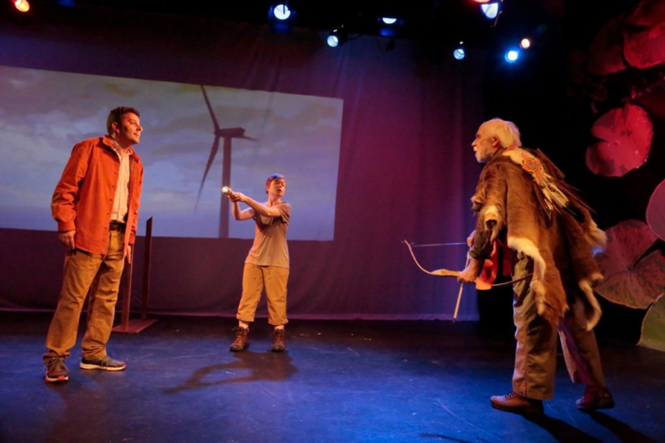 Alex Tavis as the fossil fuel industry mogul Frank, being fired upon by George Bartenieff as Uncle, an environmentalist, and Kathleen Purcell as Annie: "The wind turbine works!" in "Extreme Whether" Photo: Beatriz Schiller