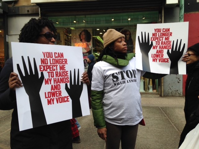 The signs were powerful; as was the presence of so many. (photo Cindy Rosenthal)