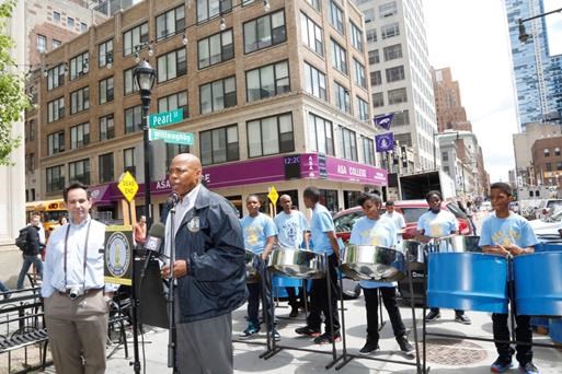 A lunchtime performance in Willoughby Plaza by the steel orchestra at MS 354 The School of Integrated Learning in Crown Heights; BP Eric Adams Luis Gutierrez, production and marketing manager for the Downtown Brooklyn Partnership. Photo Credit: Kathryn Kirk/Brooklyn BP's Office