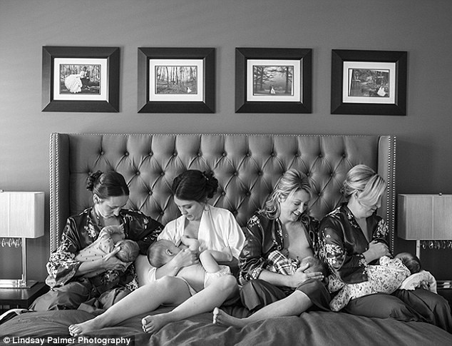 Wedding photographer captures bride and her bridesmaids breastfeeding their babies together before the ceremony in touching portrait which celebrates the &#8216;motherhood