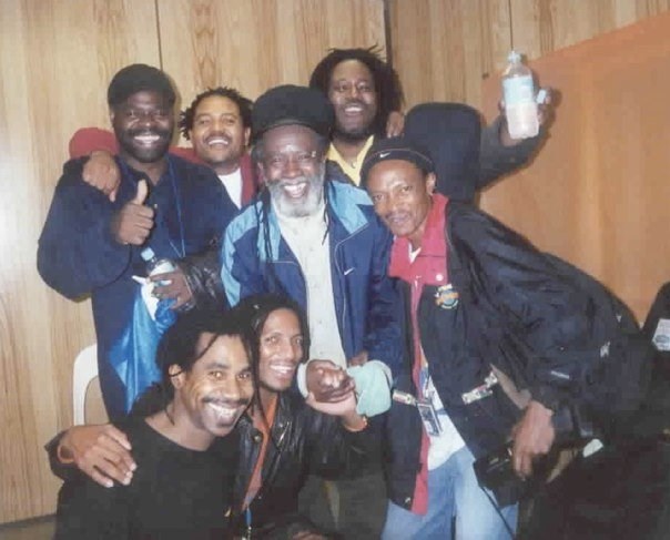 James Smith (lower left) with BURNING SPEAR (Winston Rodney, center)